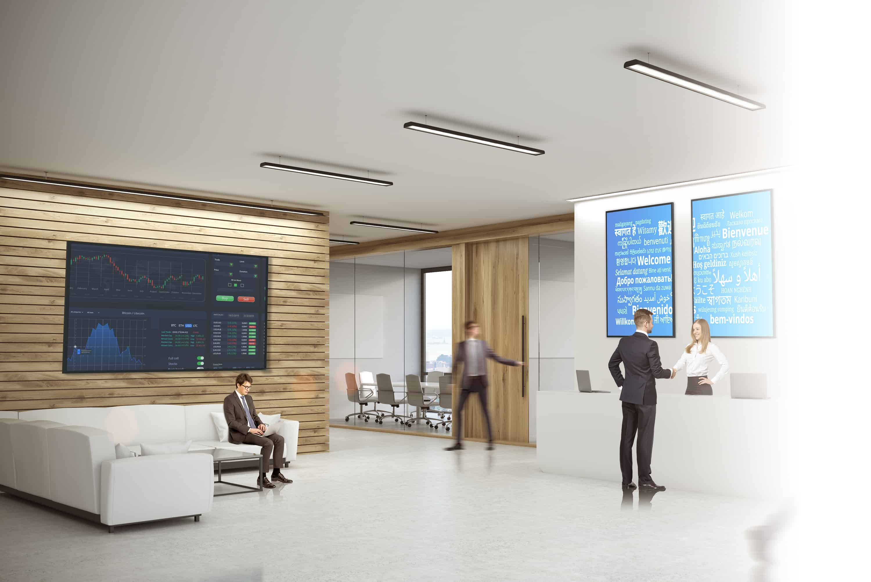 Un professionista viene accolto da un addetto alla reception. Dietro l'addetto alla reception ci sono due display Optoma N Series Professional montati uno accanto all'altro in una disposizione verticale che mostrano la parola "Benvenuto" in varie lingue.